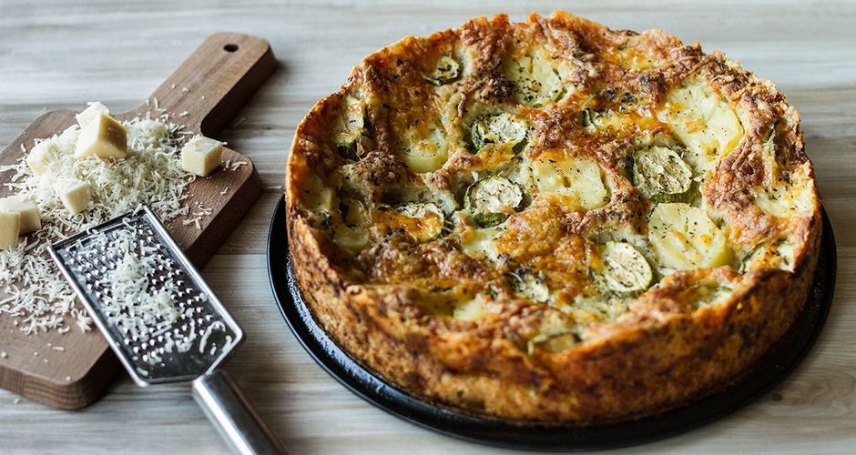 Open-faced potato, zucchini and cheddar pie